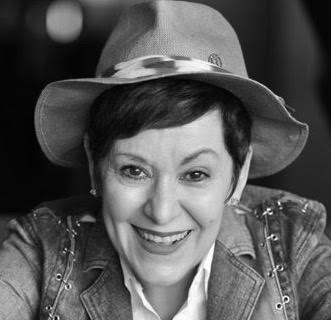 Giannina Braschi smiling at the camera.; A Conversation with Giannina Braschi: Writing Beyond Dystopia