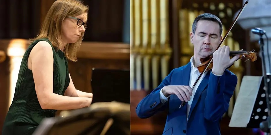 Mary Dullea in a green dress playing piano and Darragh Morgan in a blue suit playing violin.; Visit https://www.eventbrite.com/e/morton-feldmans-for-john-cage-tickets-2000201128419?aff=oddtdtcreator