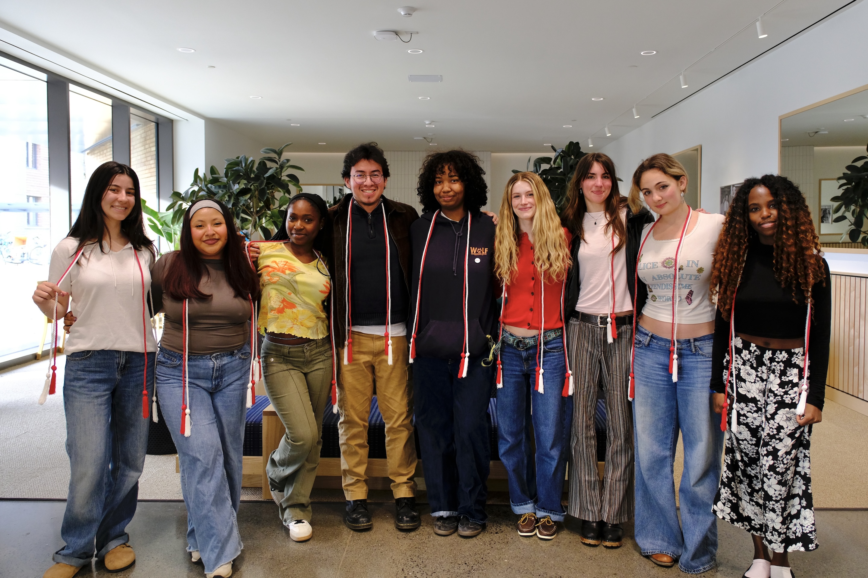 Graduating students pose with their graduation cords at the 50 Days to Commencement Countdown Celebration in April. Photo Credit: Zach Butler '29.