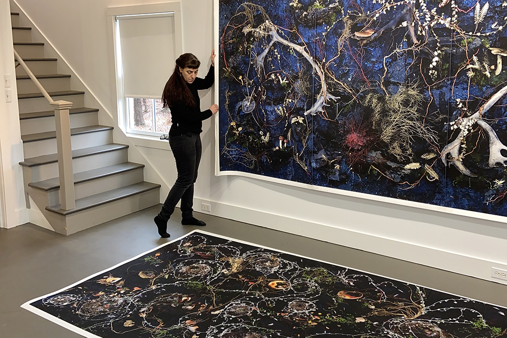 Tanya Marcuse in her studio with new large works from <em>Book of Miracles</em>. Photo by Jonah Romm ’24