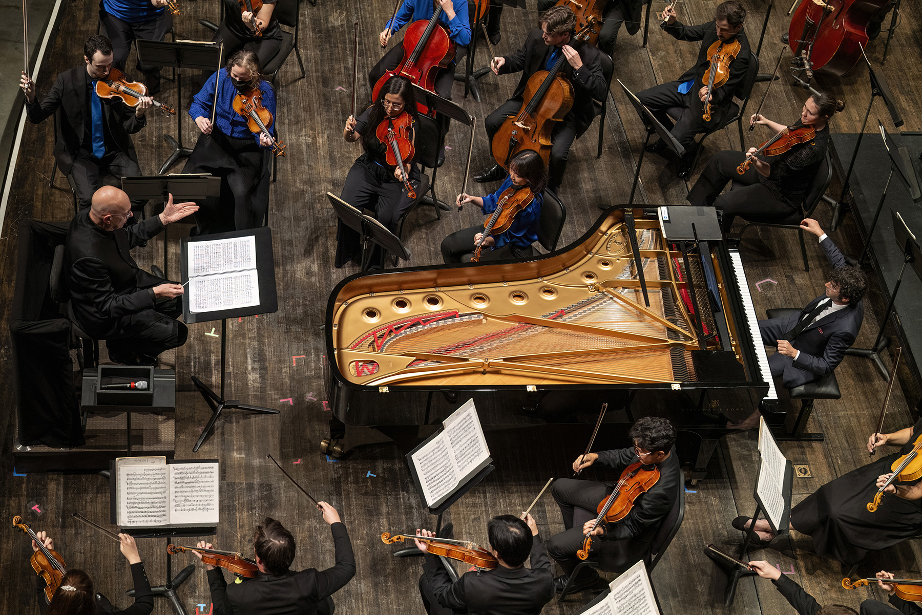 an aerial shot of an orchestra