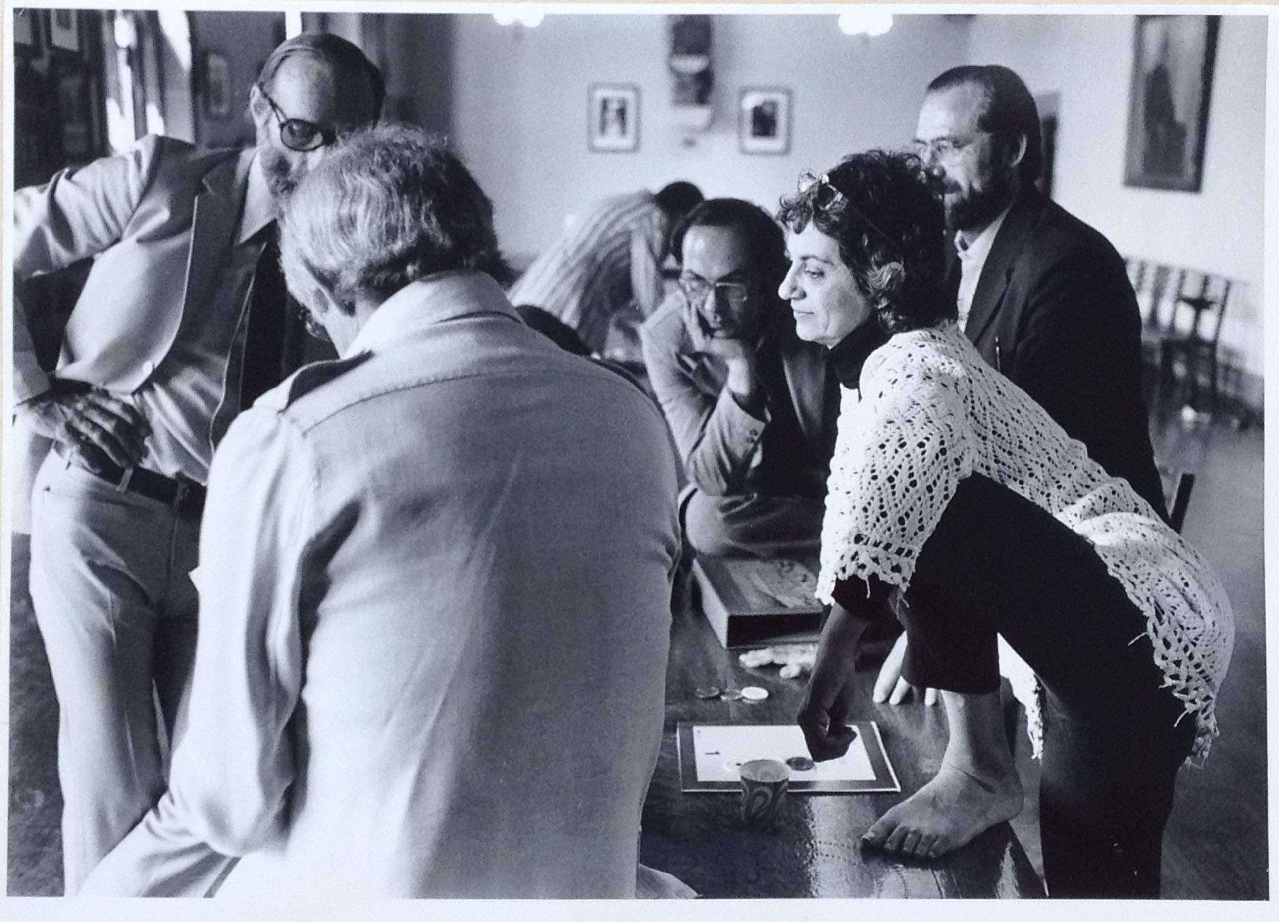 Muriel Cooper in conversation with unidentified males, c. 1972.