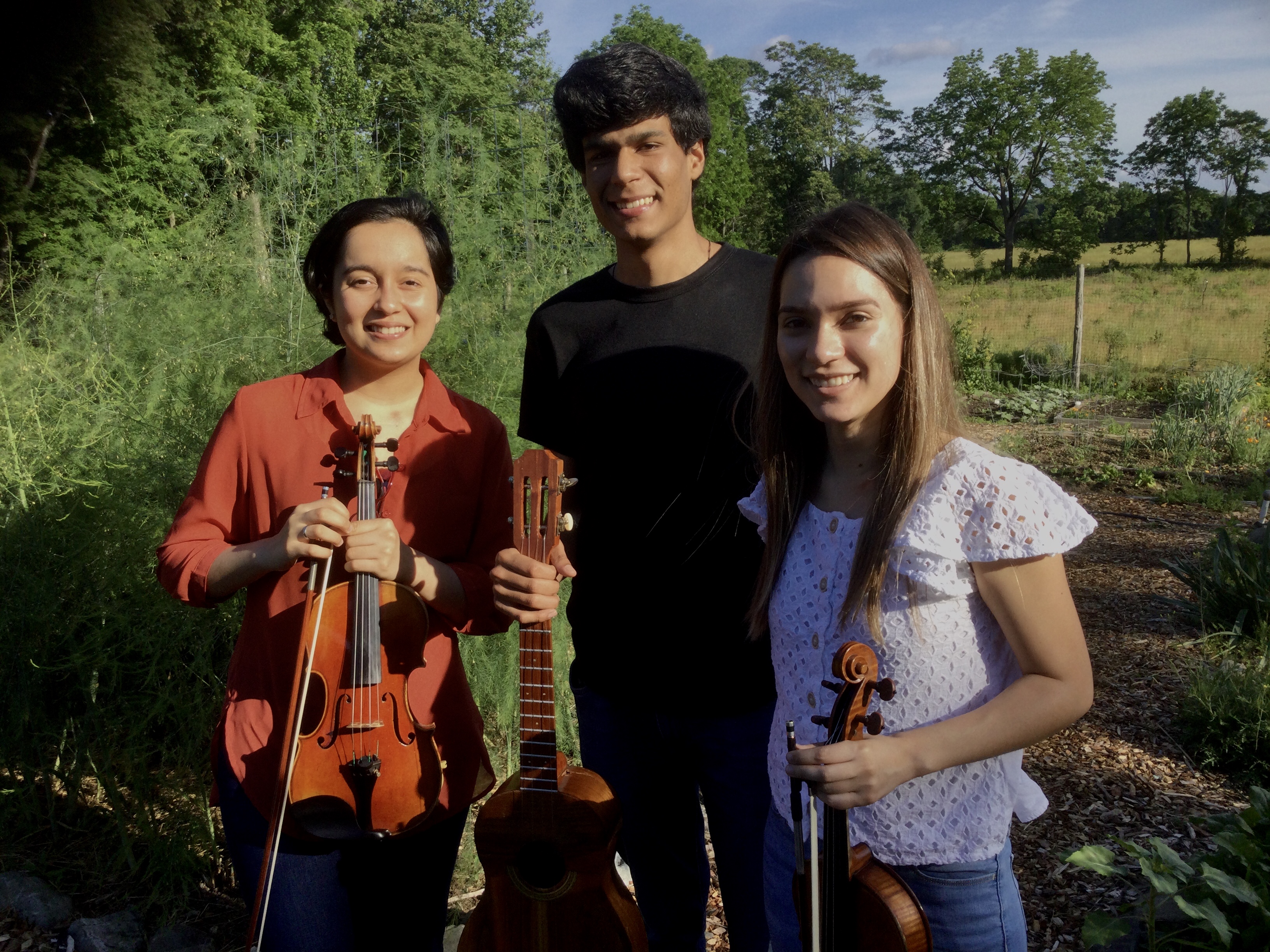 Conservatory students Laura Rangel-Perez and Ana Aparicio, violins, Juan Mora Rubio, cuatro and percussion.