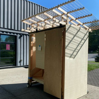 The sound booth for the Experimental Humanities center.; Constitution Day Mobile Sound Booth