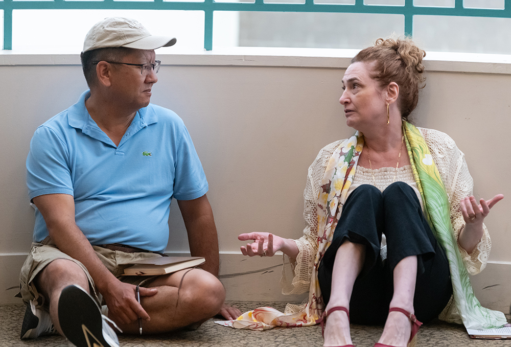 Two professors deep in debate.; IWT/CLASP Workshop on "Debate in the Classroom"