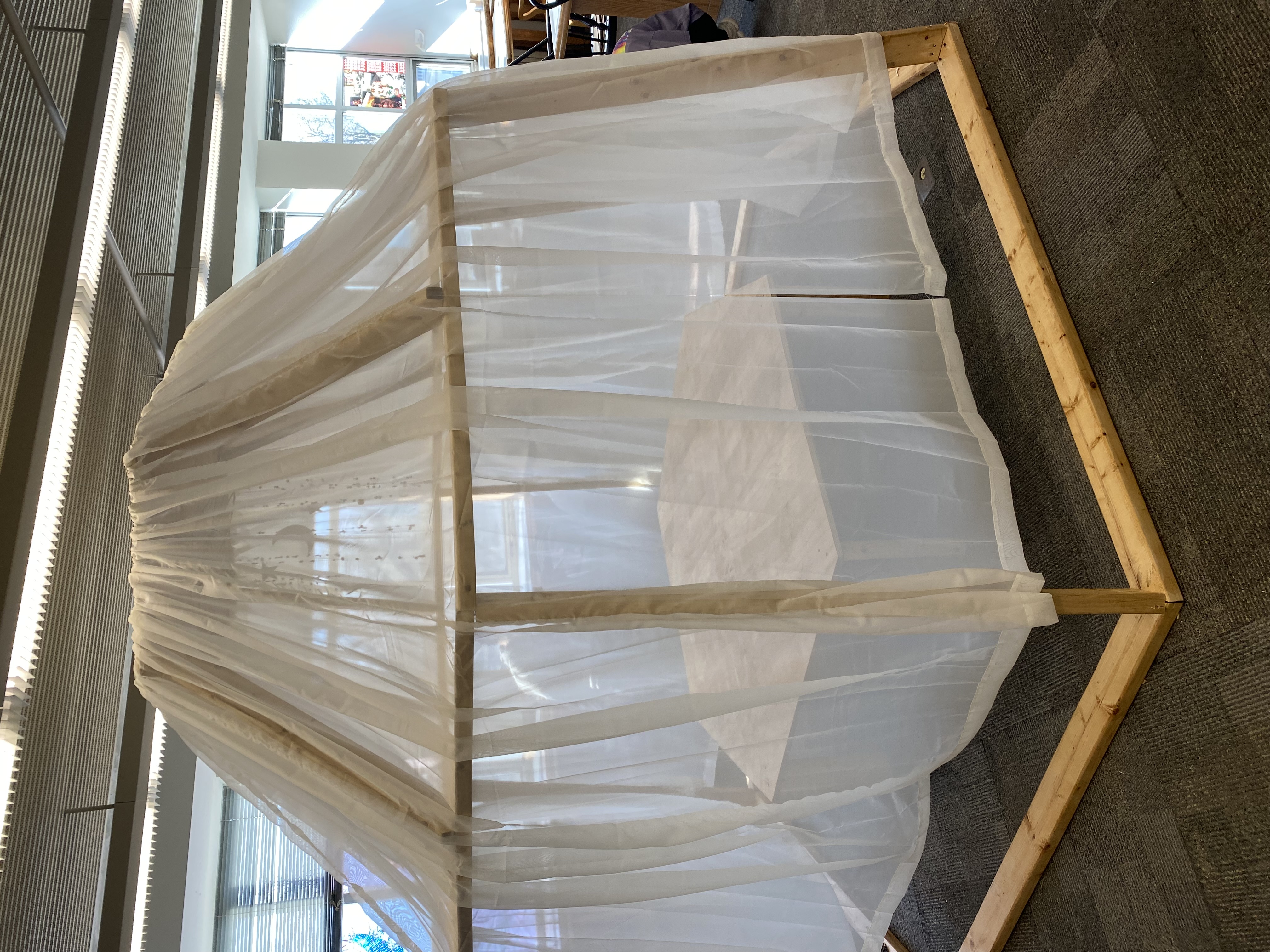 Image of The Nest, a structure made of wood and sheer fabric, installed at Stevenson Library.; Opening Celebration: The Nest