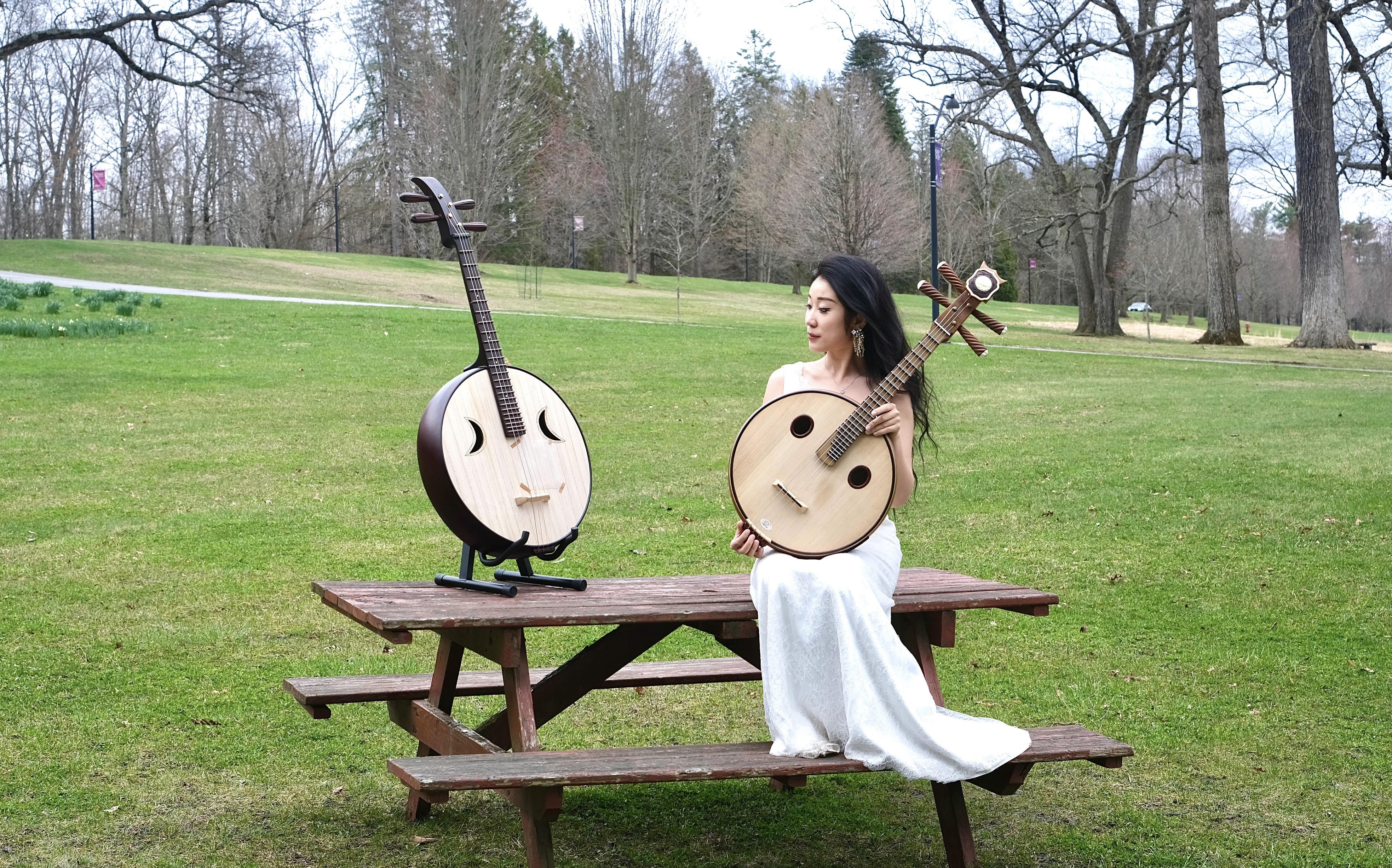 A piano on an empty stage.; Degree Recital:&nbsp;Yijie Yin, ruan