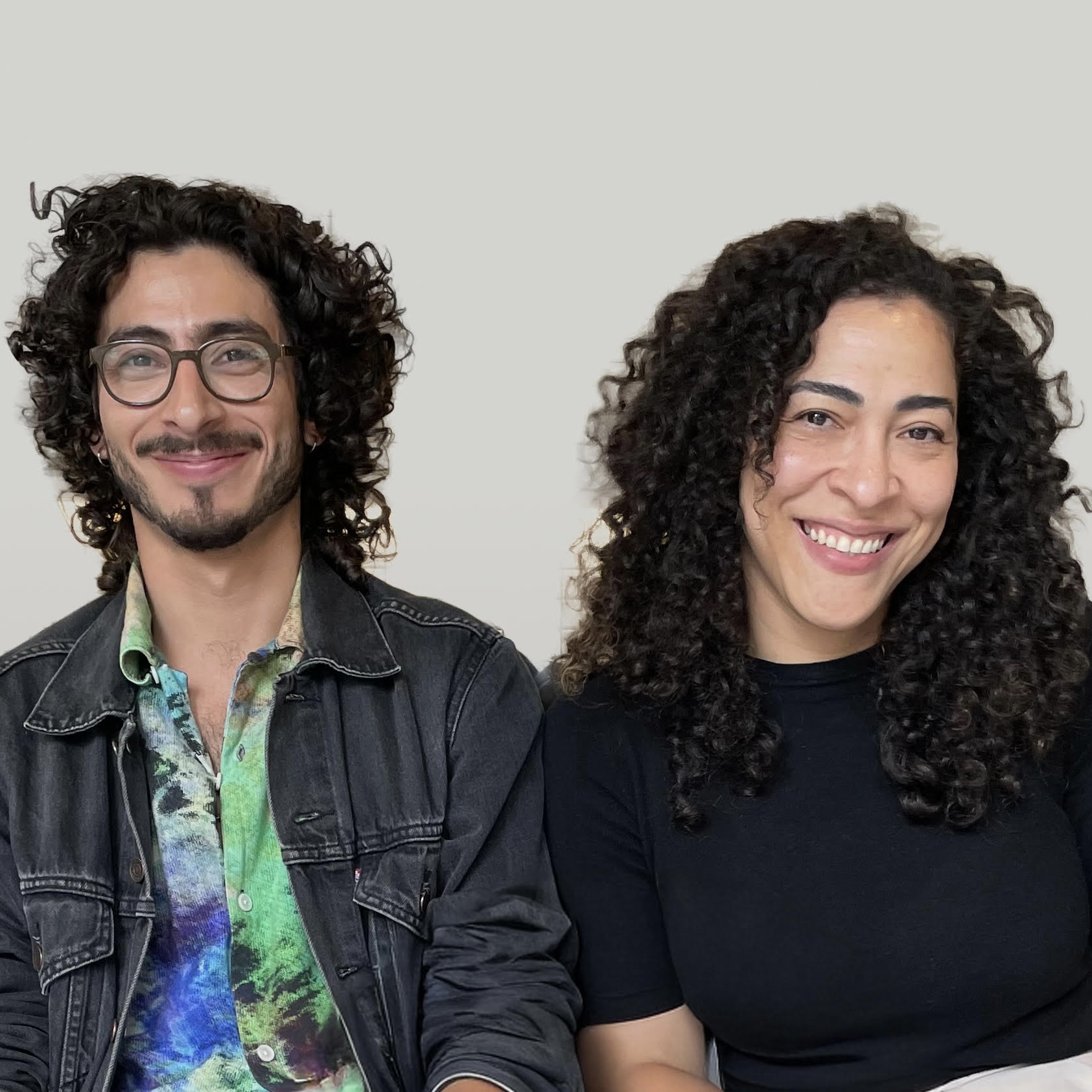 Two people smiling for the camera.; re/presentare: Reframing Evidence from the Commons