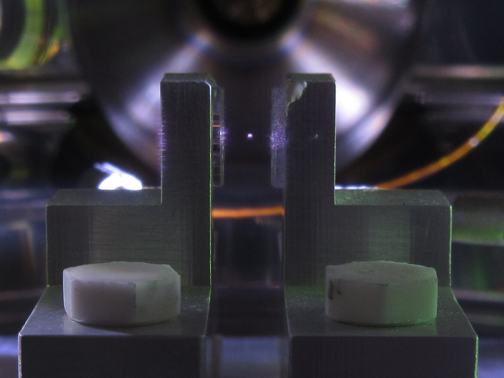 Two chairs made of a dark metallic substance.; Mechanical Sensors for Dark Matter and Neutrinos