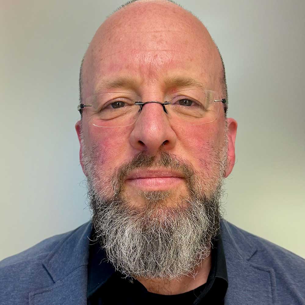 A portrait of Donn Zaretsky, senior fellow at the Ralph Ellison Center